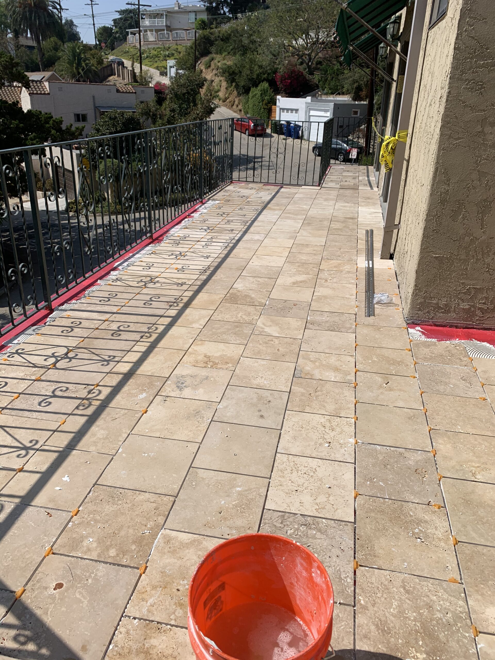 Waterproof balcony surface with natural stone tile finish