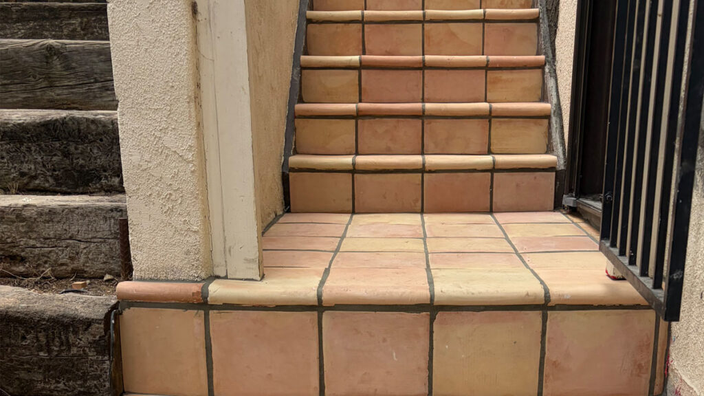Before and after tile stair renovation with new exterior stair tile