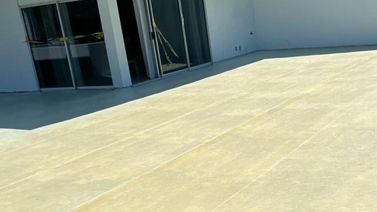 Deck waterproofing system applied to exterior surface for moisture protection