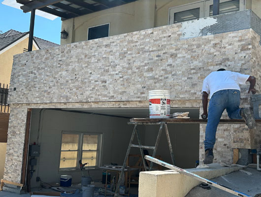 Modern architectural stone veneer detail on home facade