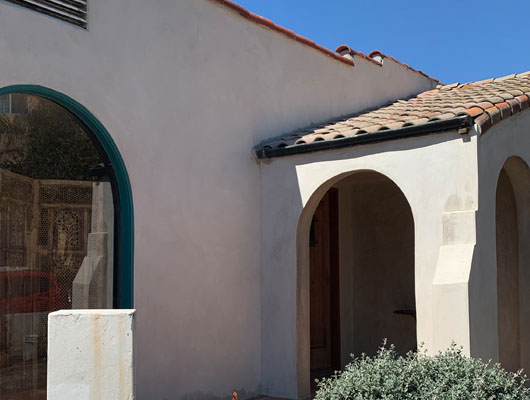 Contemporary home exterior with smooth stucco finish